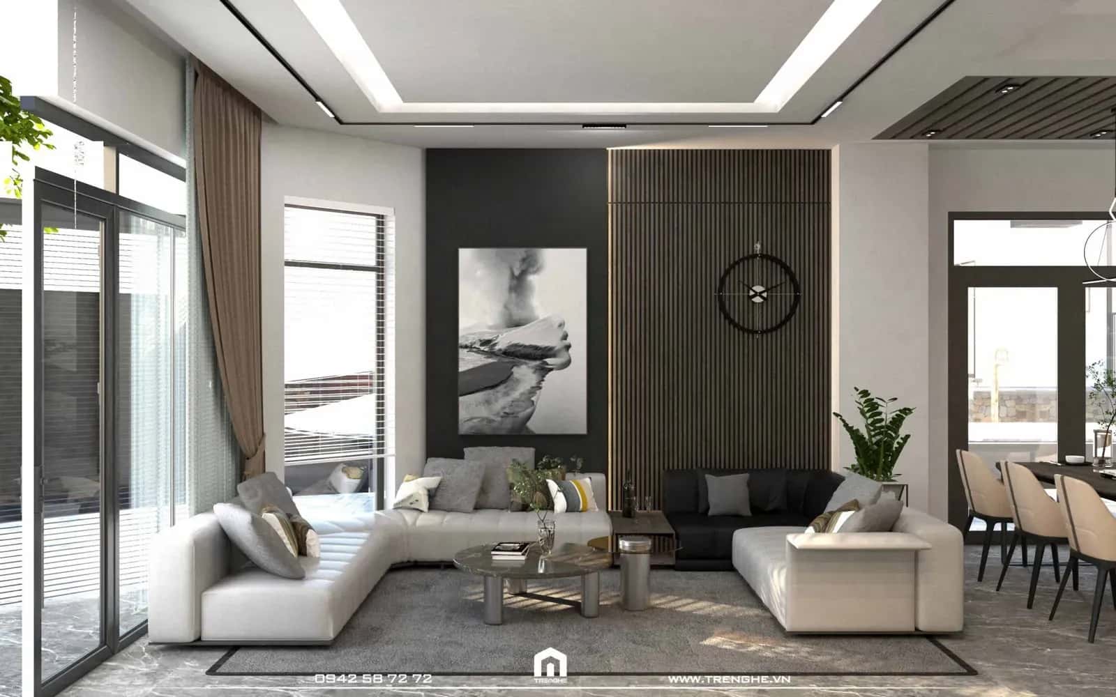 Bộ sofa bọc da được đặt giữa phòng khách nhà phố H’ House