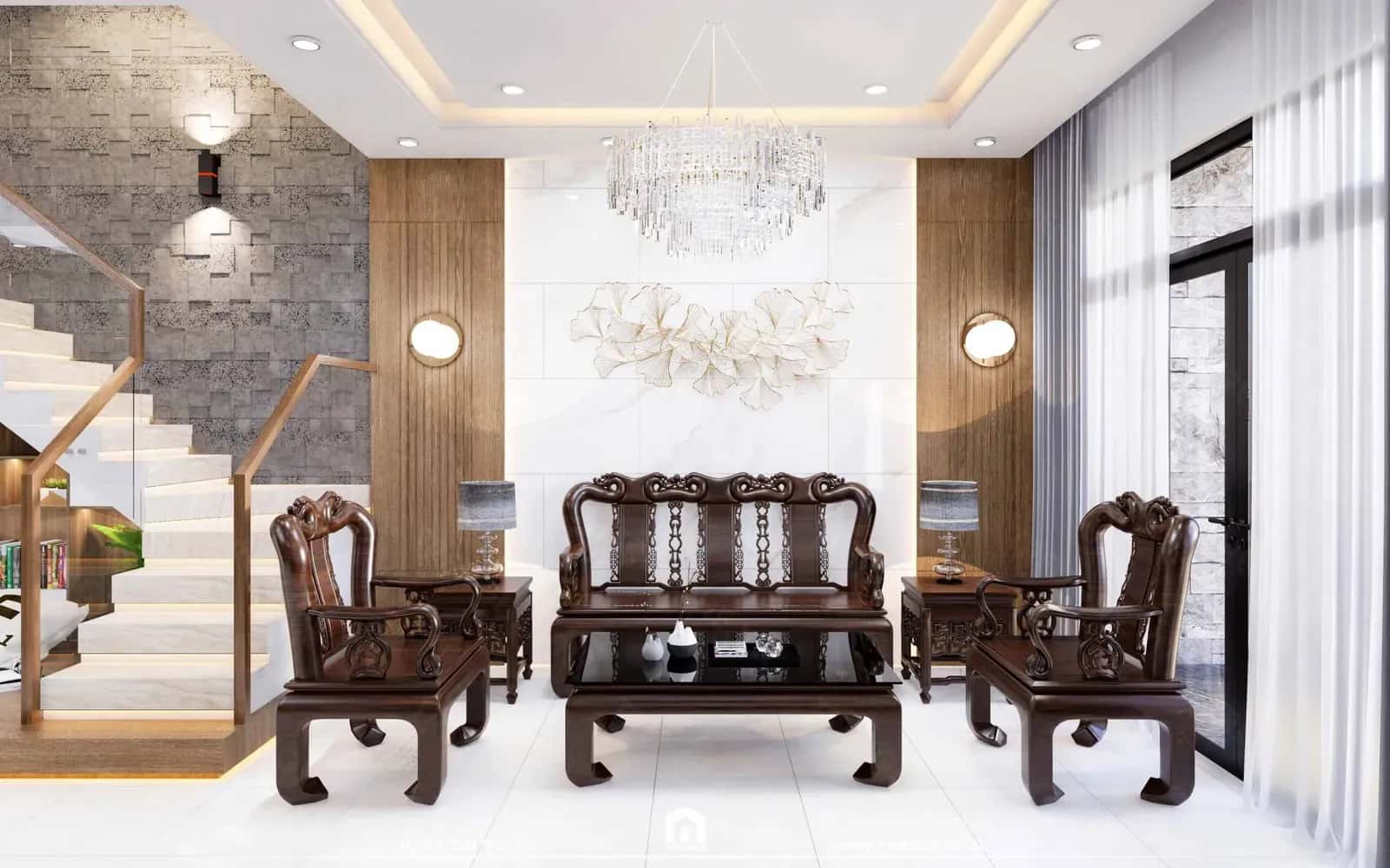 Giữa khu vực phòng khách nhà phố T’ House được bố trí một bộ tràng kỷ