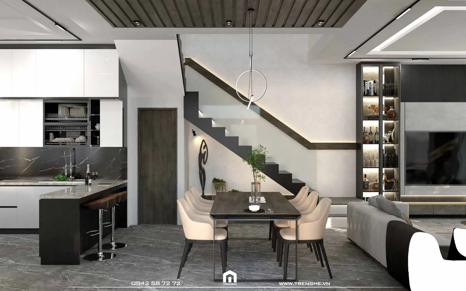 Khu vực bàn ăn với ghế tựa bọc da và trang trí cây xanh tại nhà phố H’ House