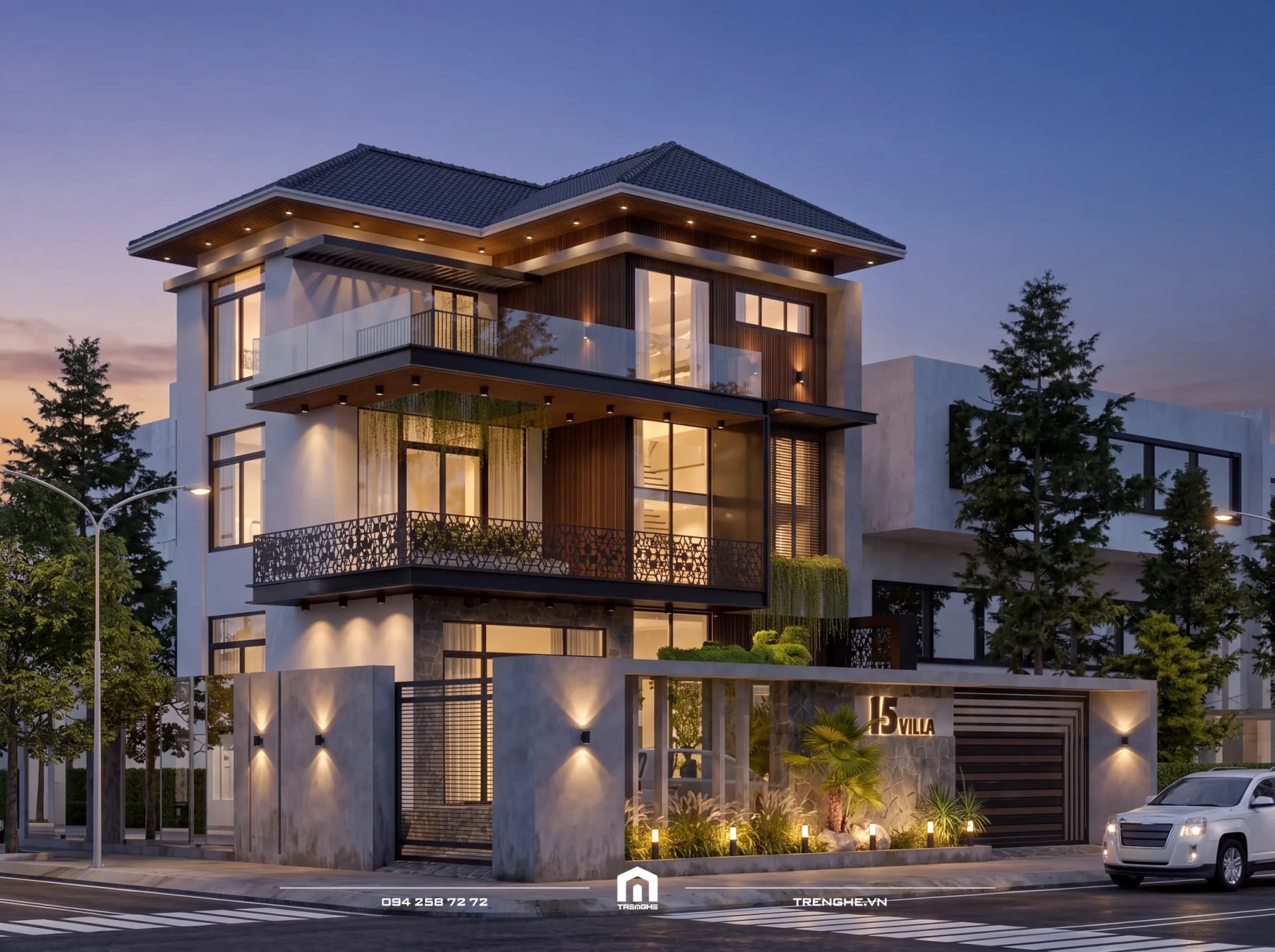 B’ Villa Long Hải lúc chạng vạng, trời tím xanh, đèn âm trần dưới mái, đèn gắn tường rào hắt hai chiều và đèn sân vườn