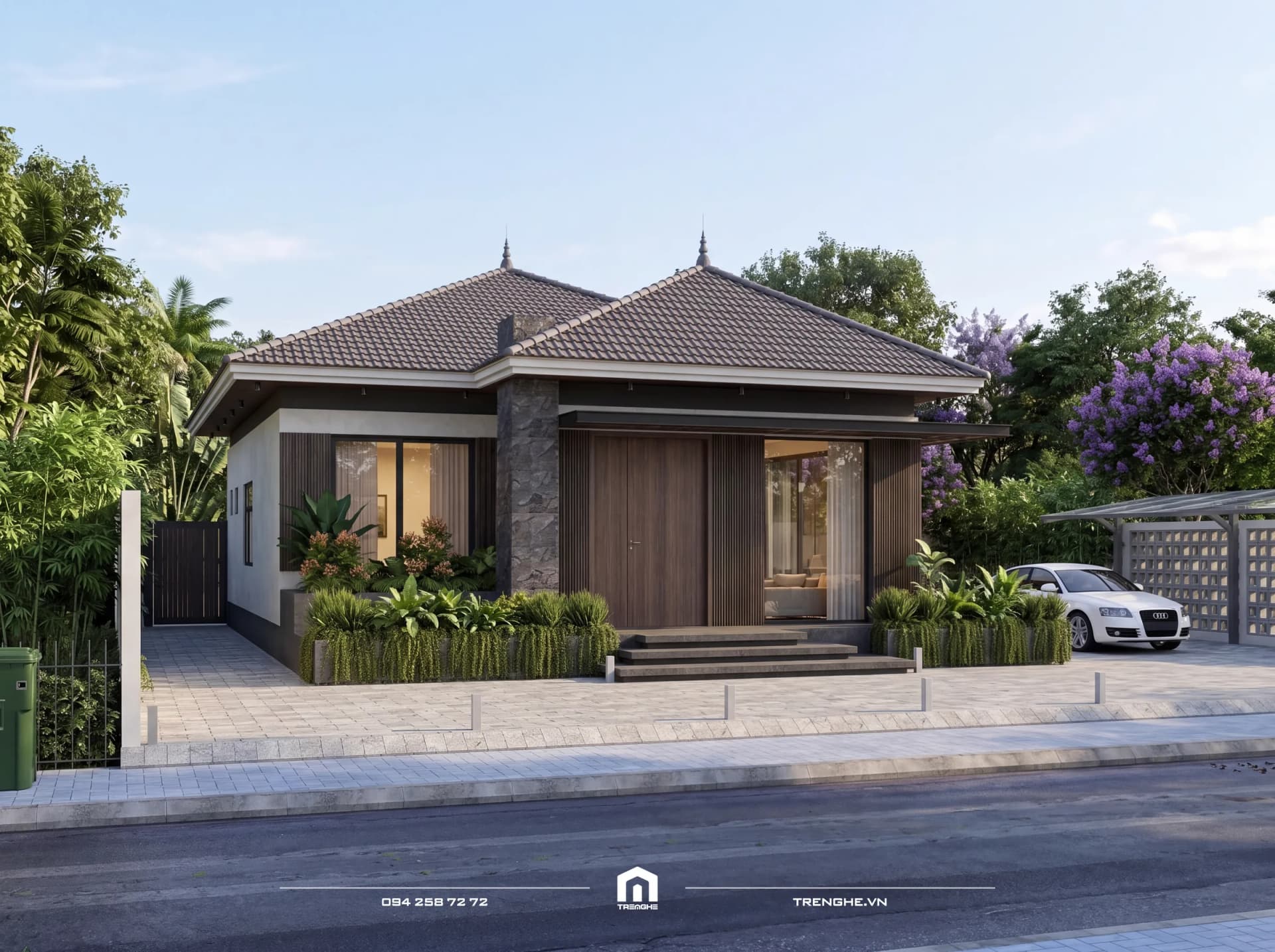 Mặt tiền nhà vườn mái Nhật một tầng D’ House ban ngày với mảng tường đá xám thô, cửa gỗ lớn, bậc tam cấp và bồn cây rủ
