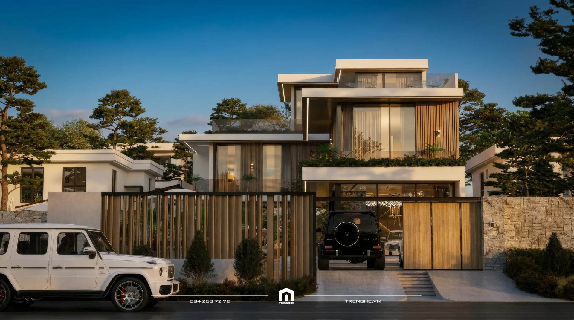 Mặt tiền biệt thự hiện đại D’ Villa Long Hải lúc hoàng hôn với cổng lam gỗ và vườn cây