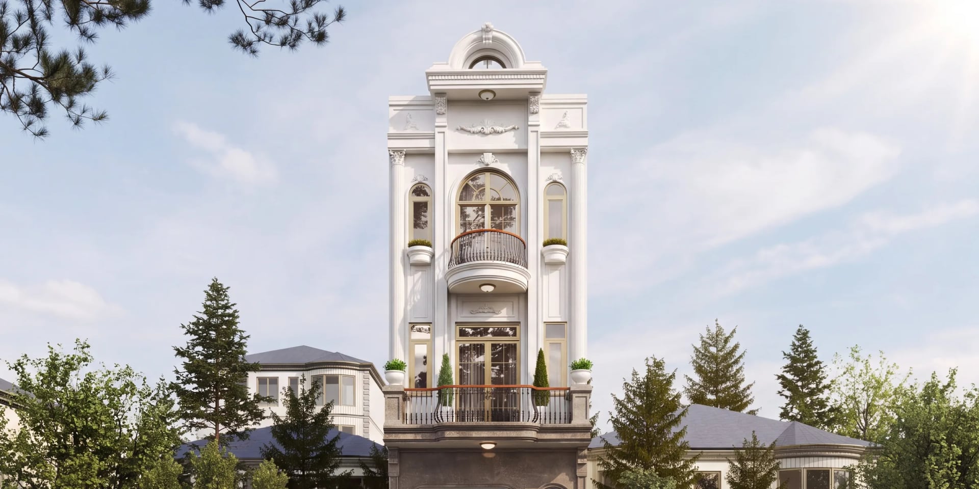 Phần trên mặt tiền H’ House Vũng Tàu ban ngày: mái vòm, cột Corinthian, cửa sổ vòm và hai tầng ban công sắt uốn tân cổ điển