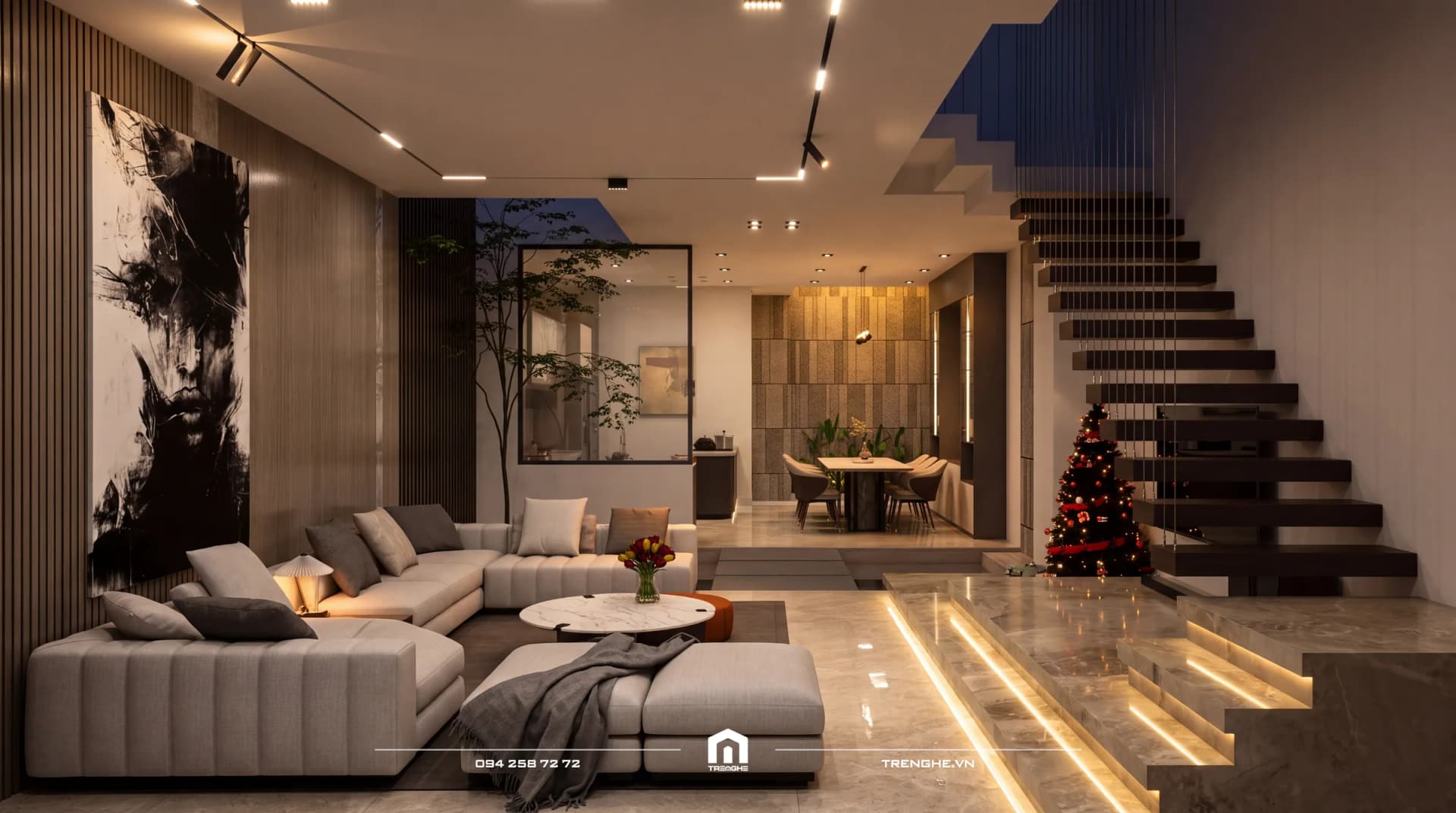 Phòng khách KA’ House buổi tối, đèn LED hắt sáng các bậc ốp đá marble dưới chân cầu thang bay