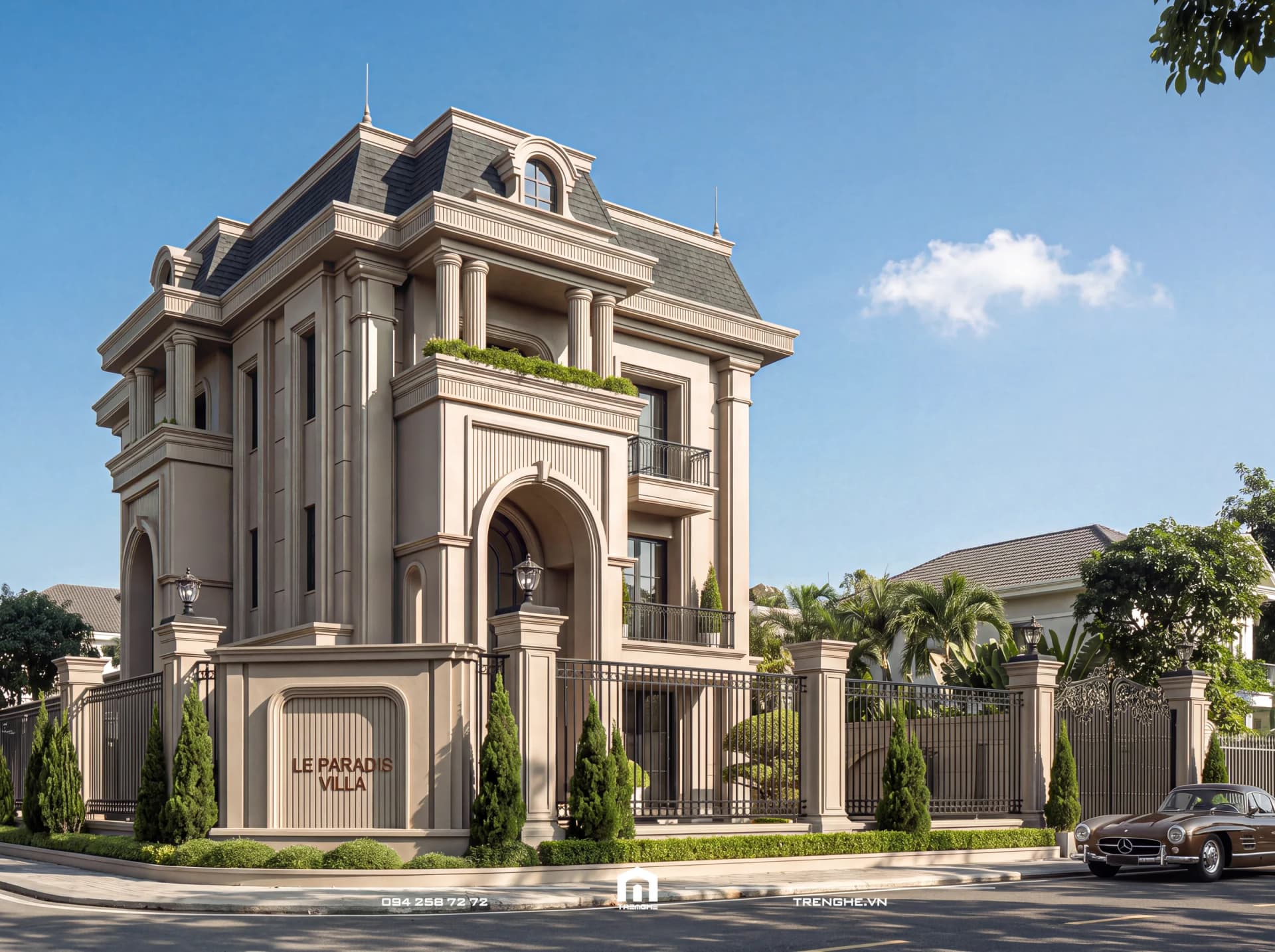 Góc nghiêng biệt thự tân cổ điển Le Paradis Villa ban ngày: bảng tên trên tường rào, thức cột vuông, cửa vòm sảnh đón và mái Mansard ngói xám có cửa sổ mái
