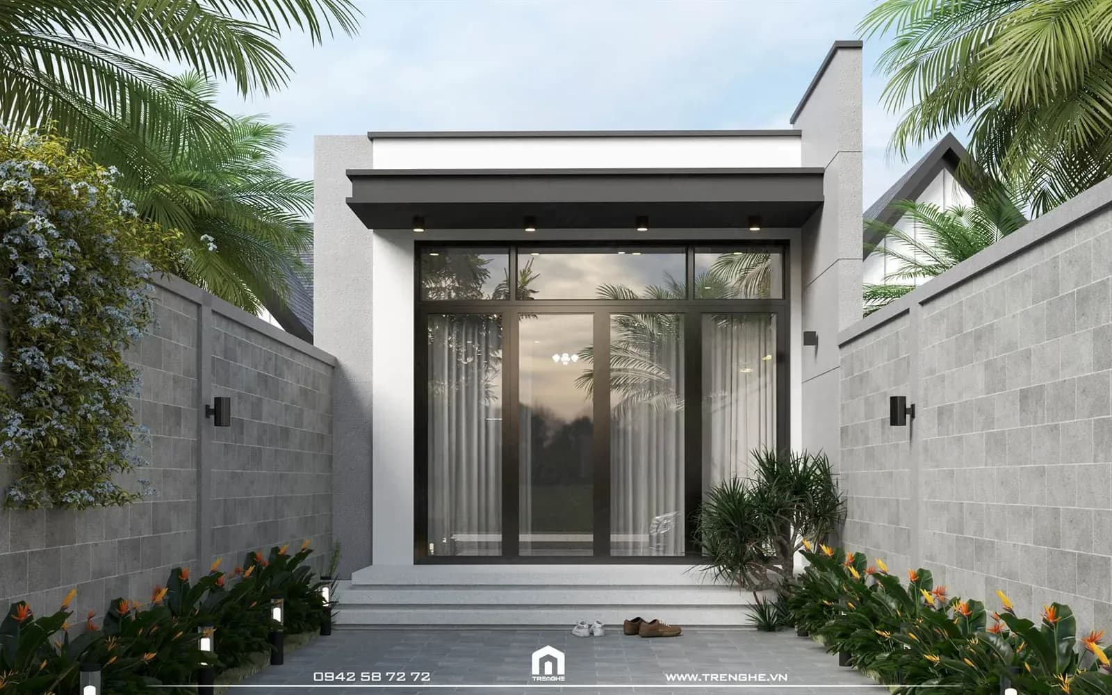 Mặt tiền nhà vườn hiện lên với nét hiện đại, thanh thoát trên nền tường trắng sáng tinh khiết.